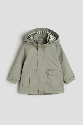 Hooded cotton parka - Long sleeve - Regular length - Khaki green - Kids | H&M GB